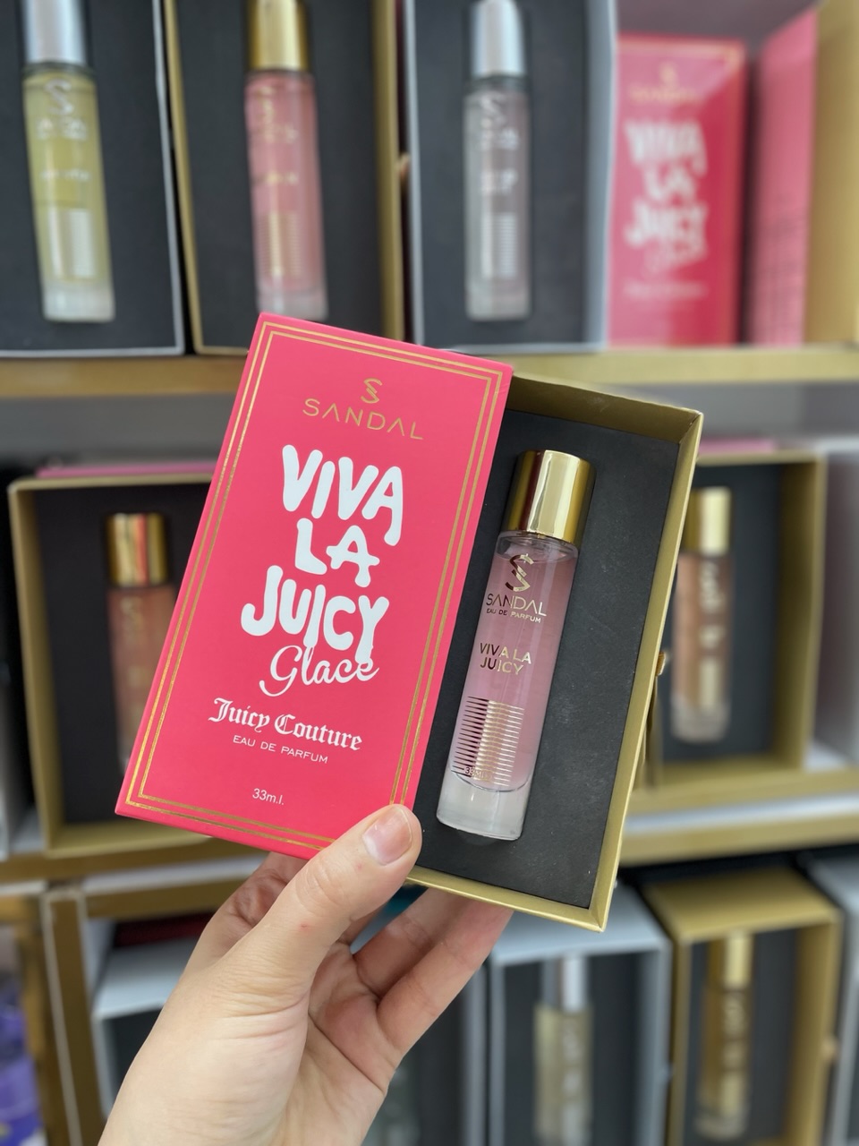 ادکلن ویوالا جویسی صندل ۳۳ میل JUICY COUTURE - Viva la Juicy 